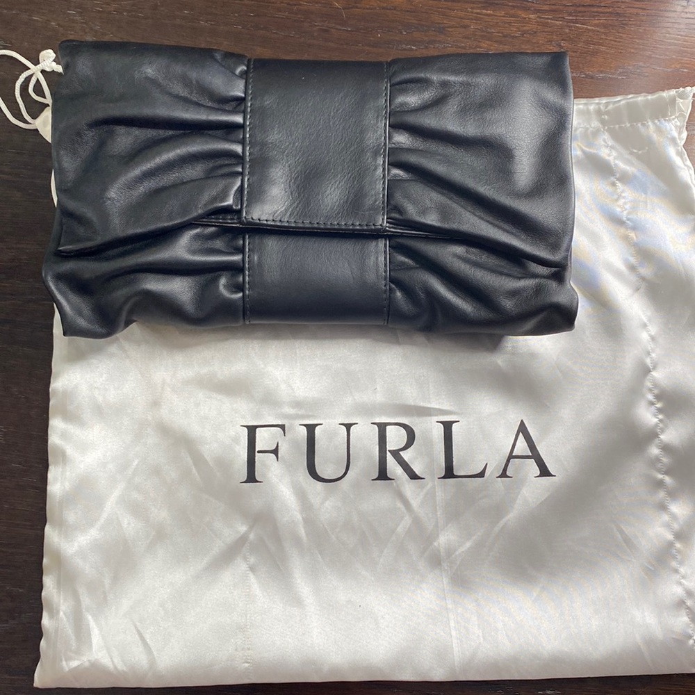 Furla black leather evening clutch bag. Never used. ALL OFFERS CONSIDERED